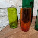 Mismatched colored glass orangeade set with pitcher and 6 glasses