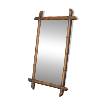 Grand miroir faux bambou en bois massif et miroir patiné, début XXe siècle