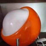 Orange table lamp in Bauhaus style