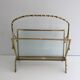 Bamboo-style brass magazine rack from the Baguès house.