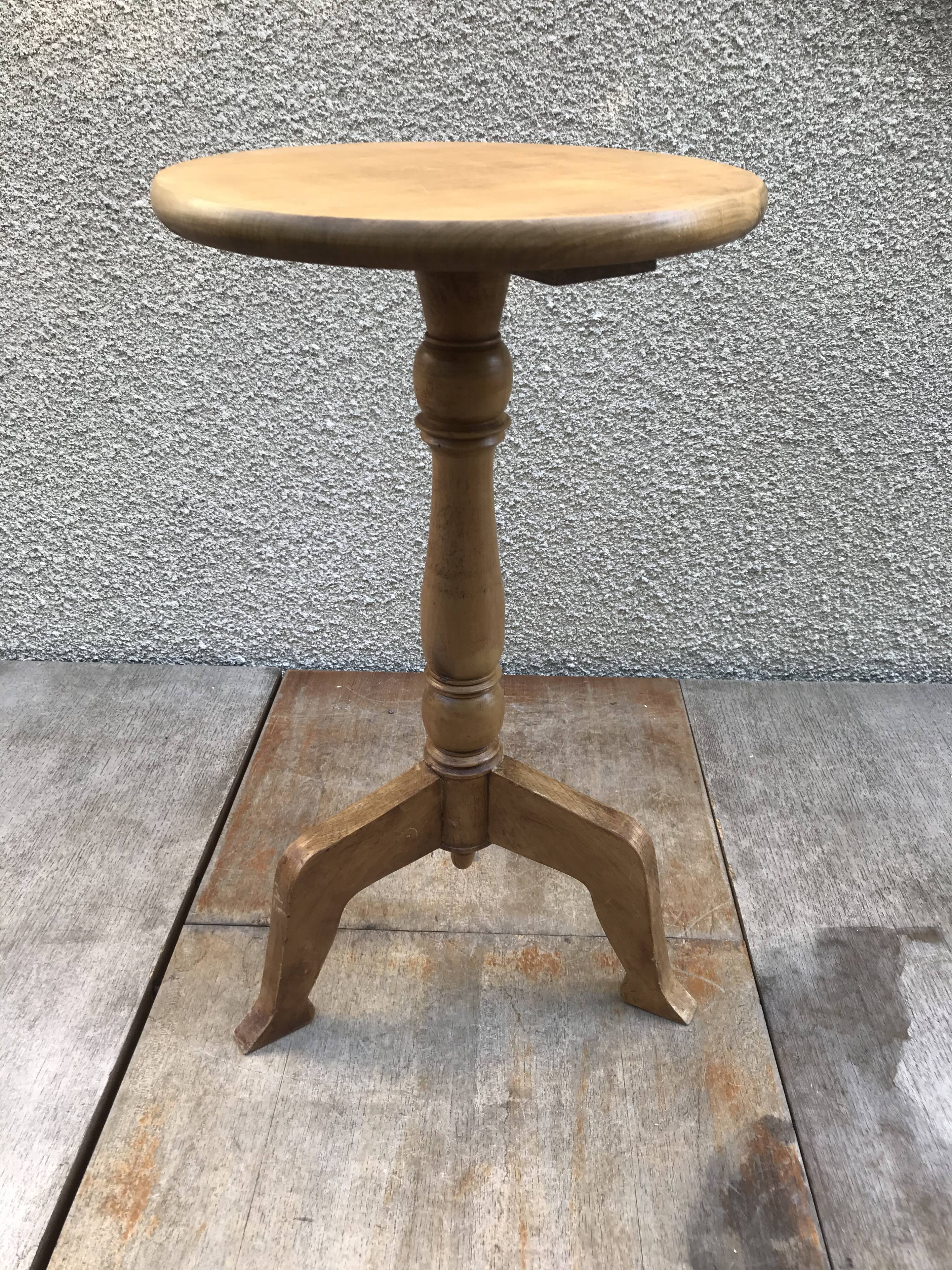 Old vintage wood tripode table