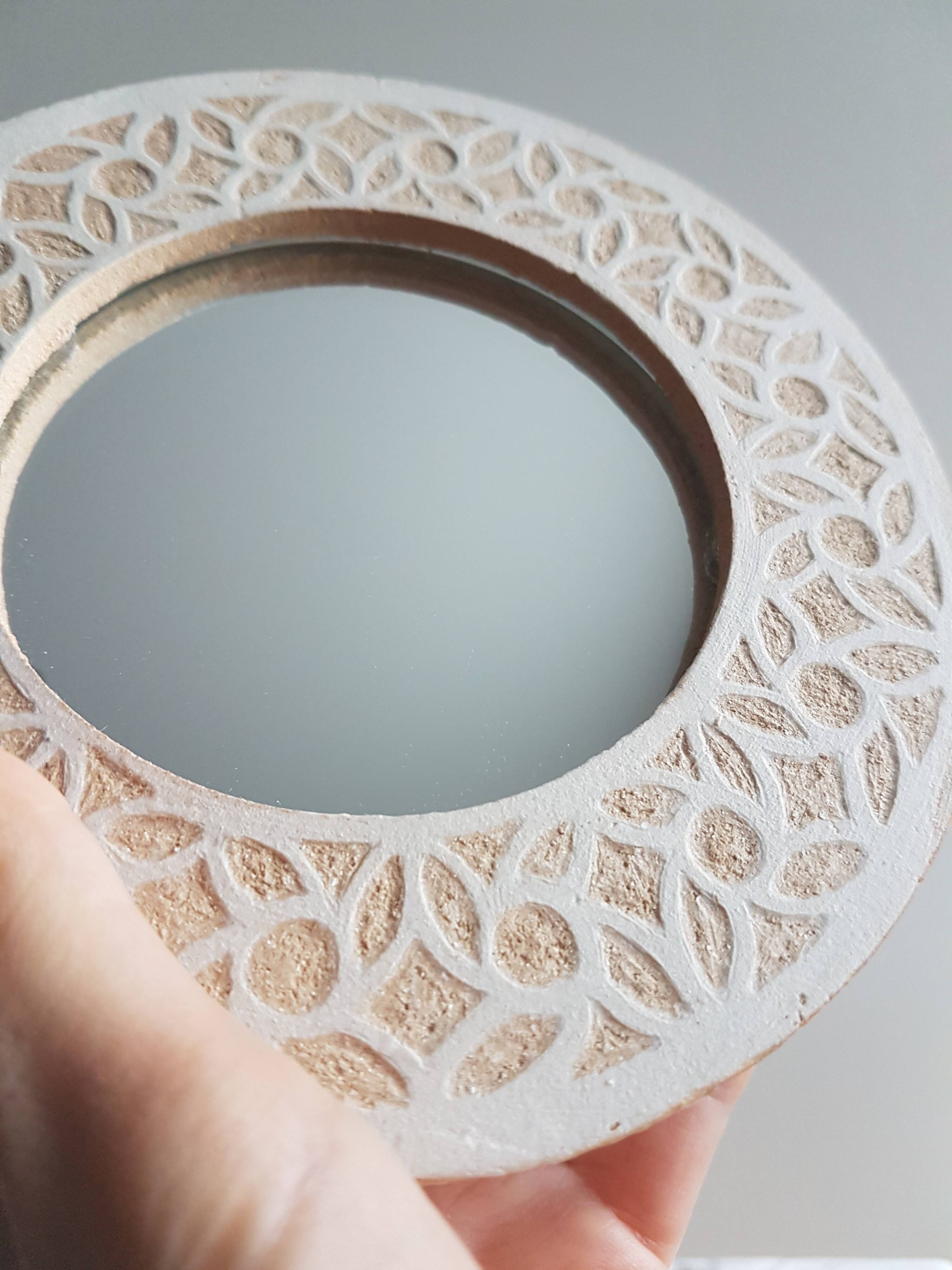 Stoneware mirror with sgraffito decoration