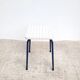 Vintage 80s melamine stool in navy blue checkered pattern.