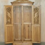 Vintage hand-carved wardrobe in Art Nouveau style.
