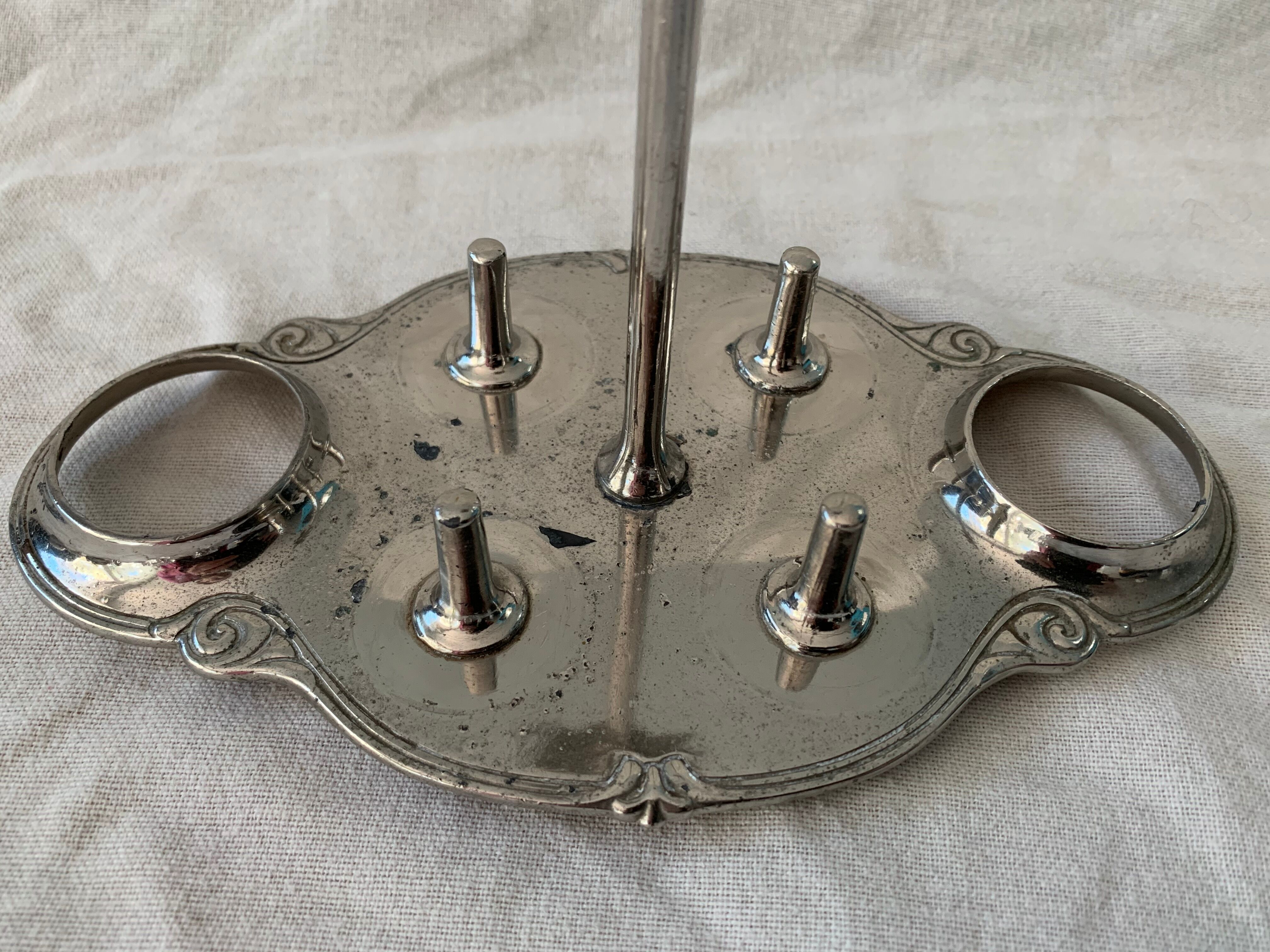 Old serving for boiled eggs with 4 metal cockroaches