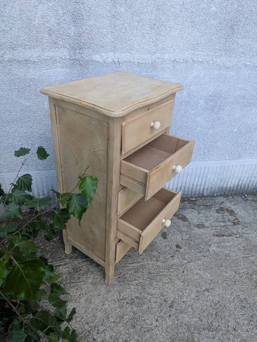 Natural wood chest of drawers