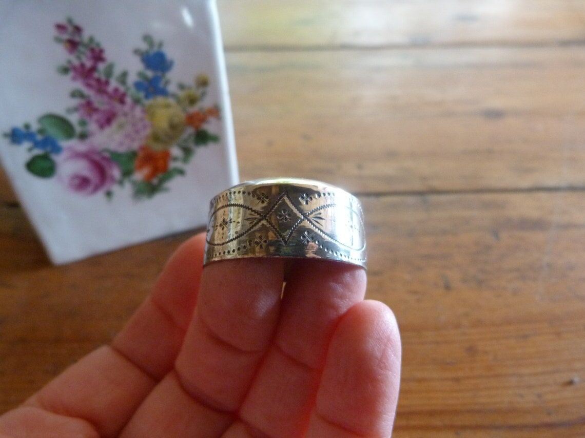 Floral porcelain bathroom bottle with engraved silver cap