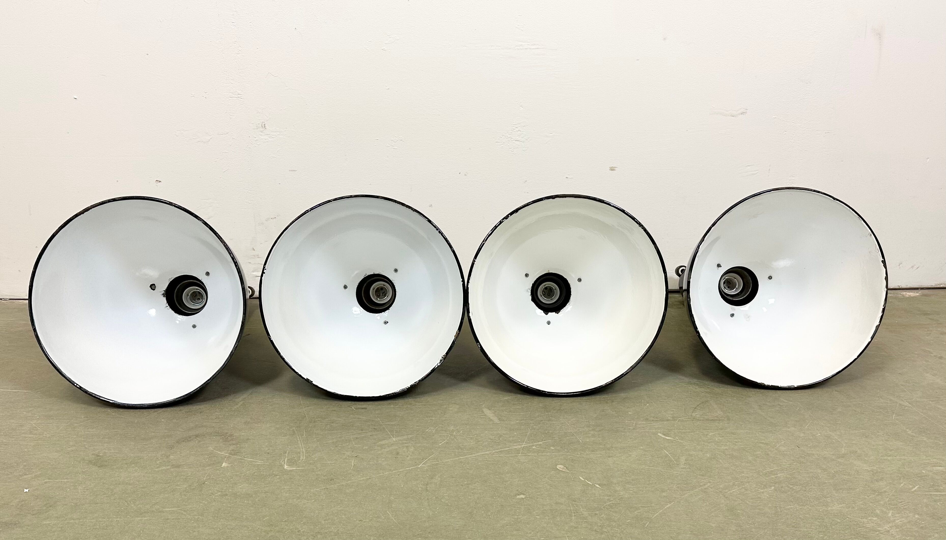Set of 4 industrial bauhaus black enamel pendant lamps, 1960s