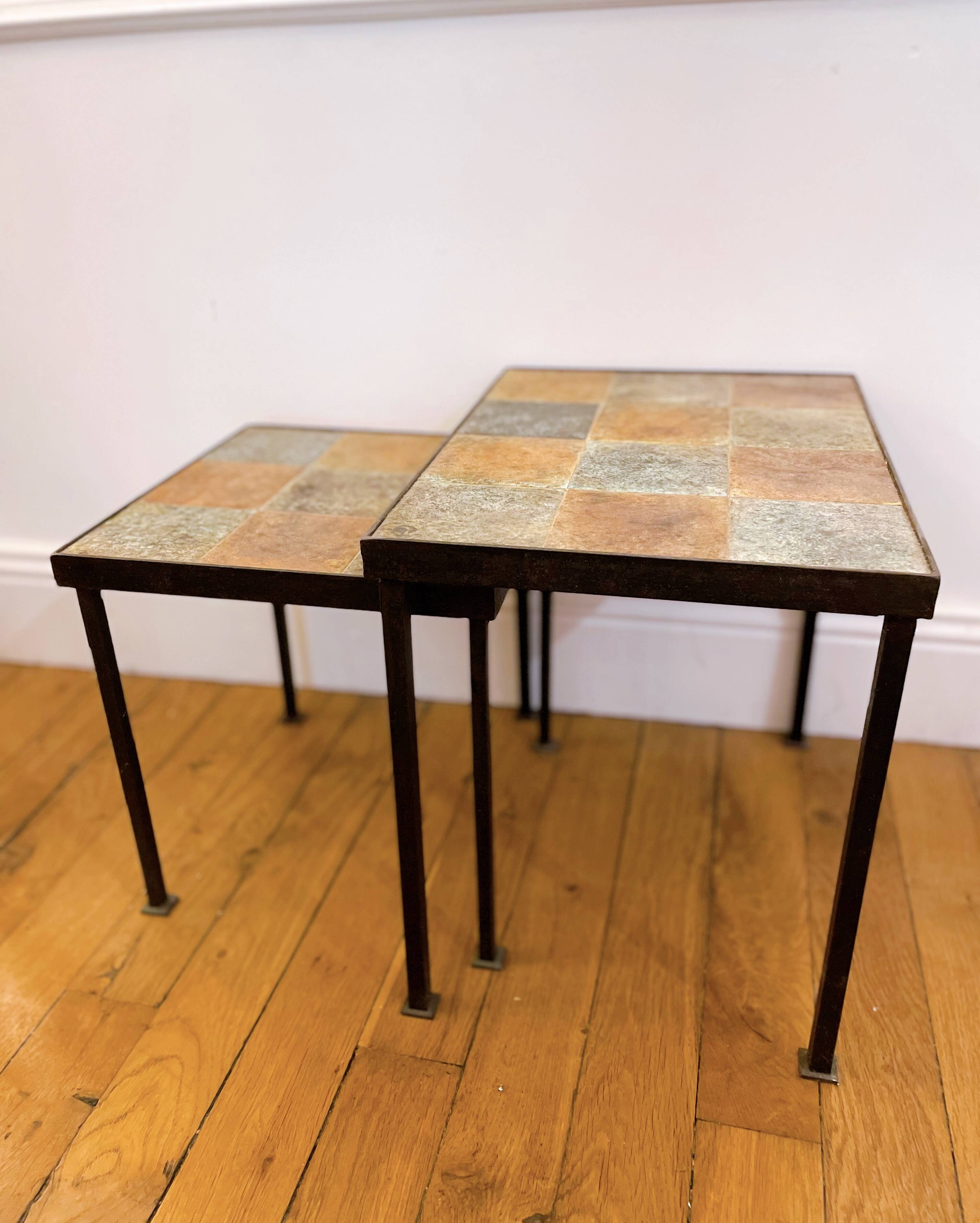 Nest tables in ceramic and metal