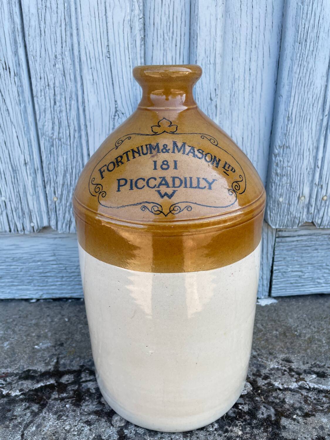 Old English stoneware jar or jug with a glazed finish.