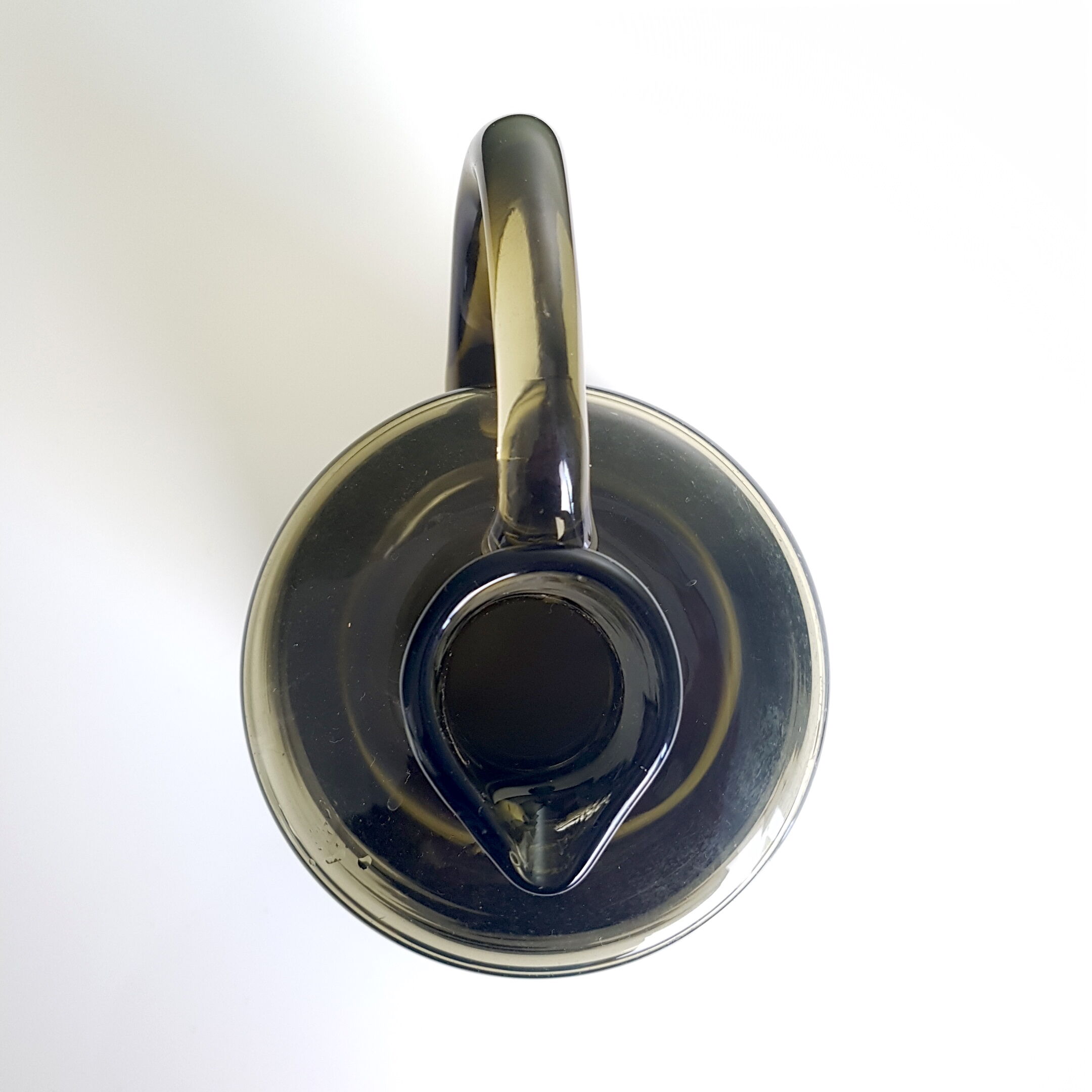 Thick handmade blown glass pitcher