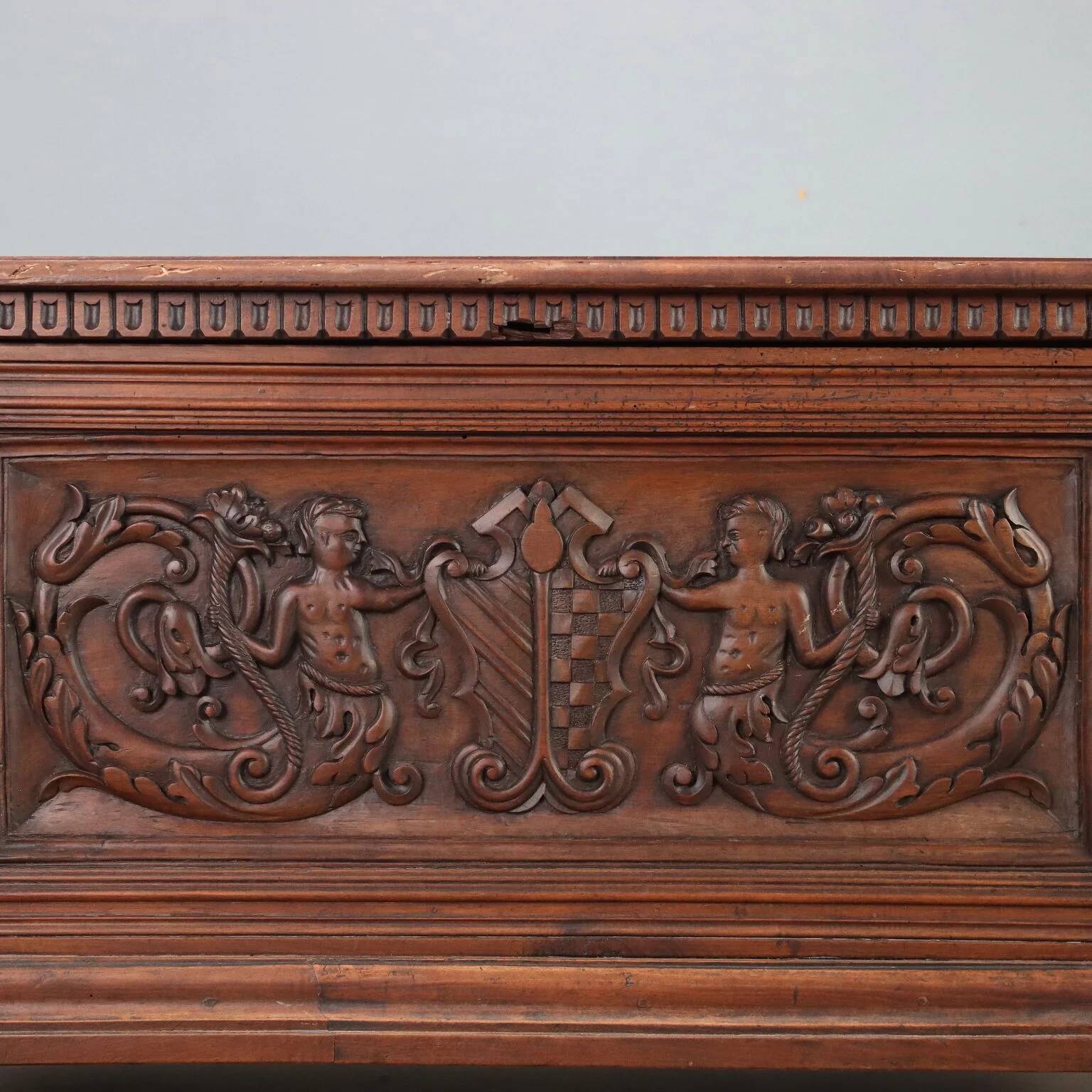 Walnut chest with baroque carvings