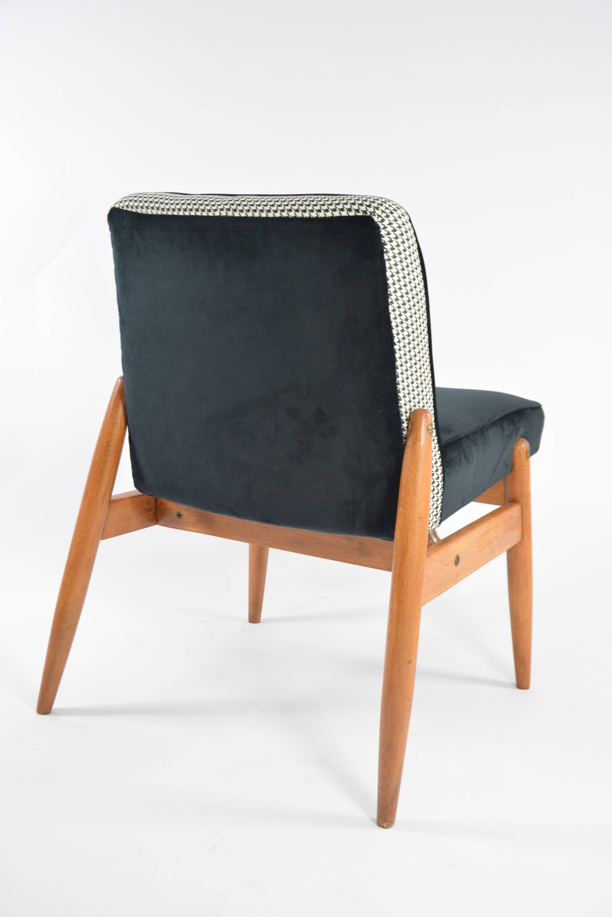 Black and white armchair without armrests