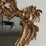 Antique mirror in gilded metal