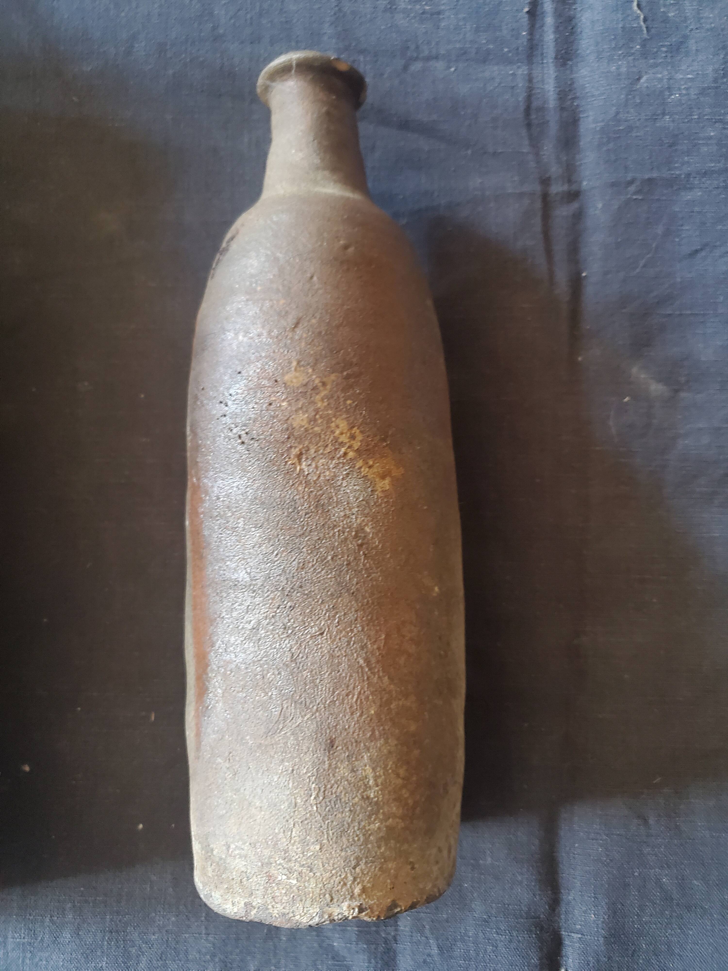 3 terracotta bottles