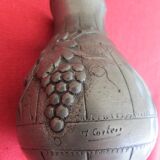 Small pewter pitcher, signed “Cortési”