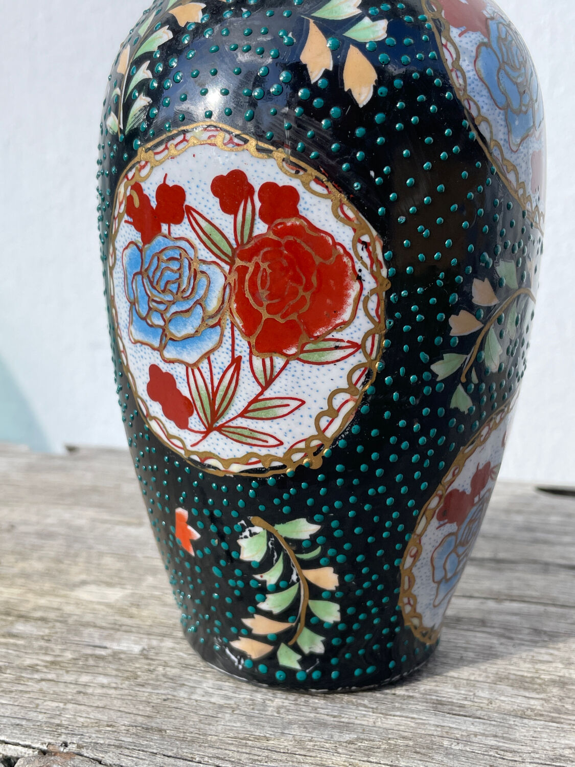 Asian vase in black ceramic with floral decoration