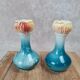 Pair of small antique bud vases numbered 396.