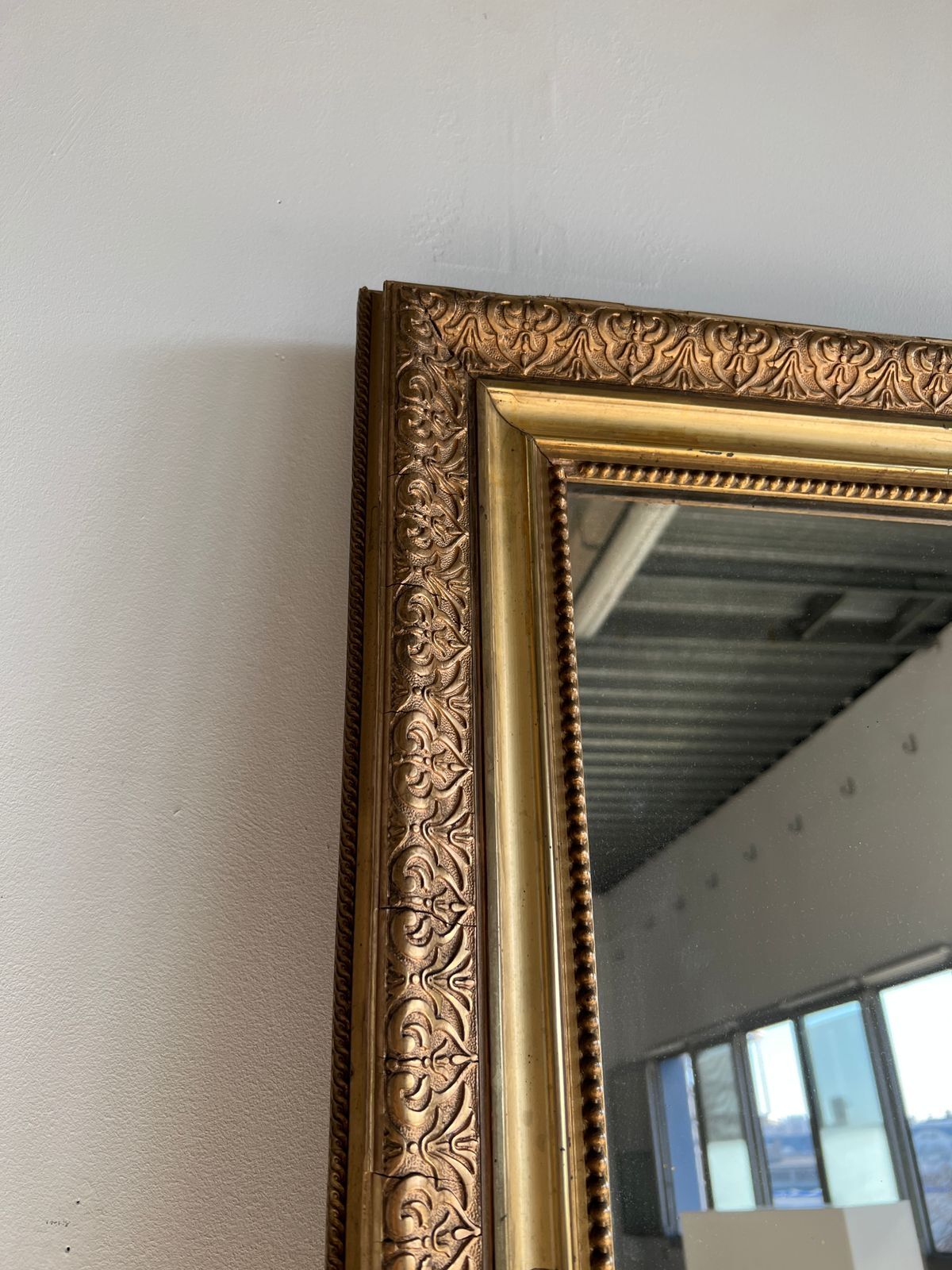 Gilded mirror with frieze h2m10 l:73cm