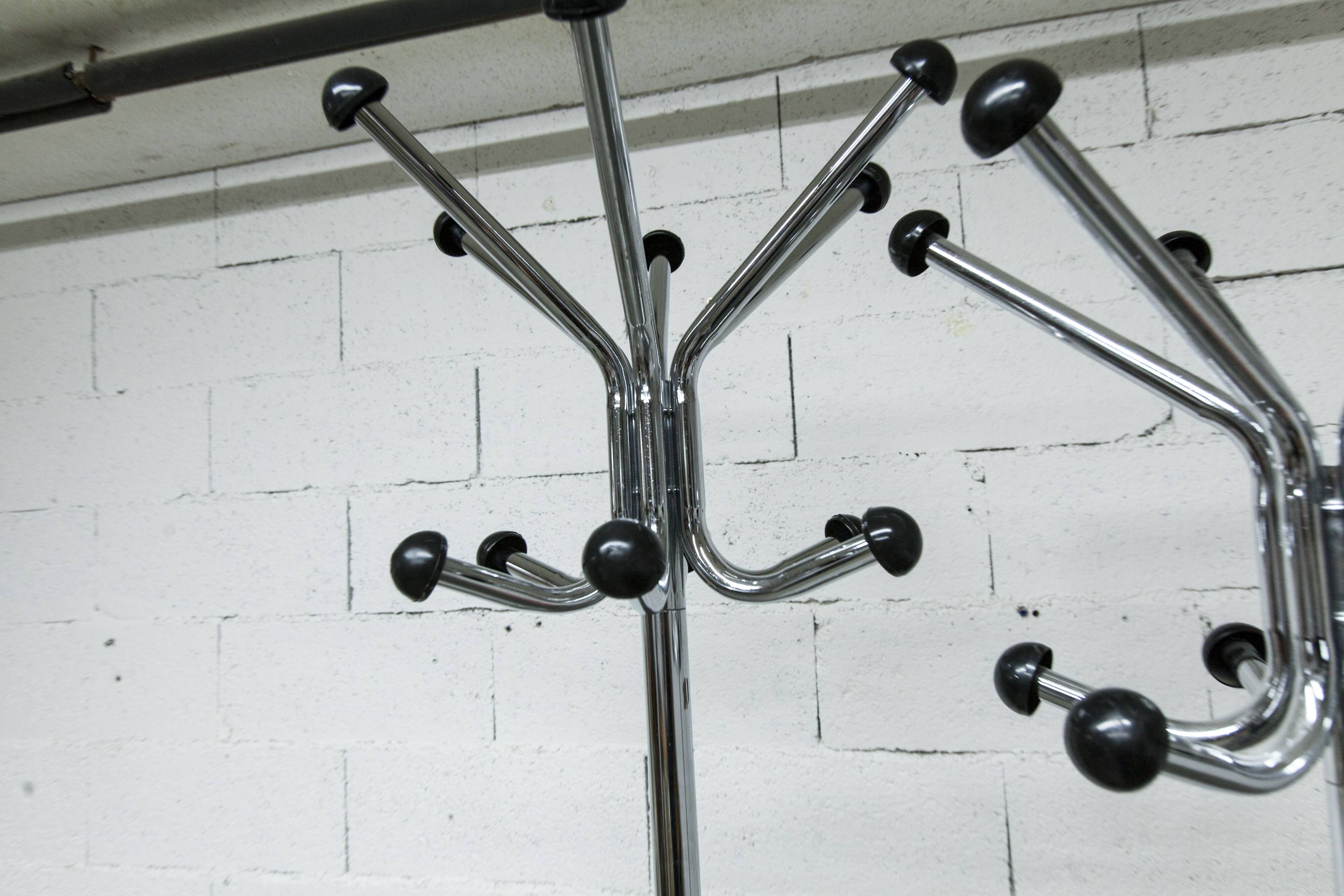 Coat rack with 12 chrome and black plastic hooks, 1960, 2m.