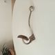 Antique steel wall-mounted coat rack