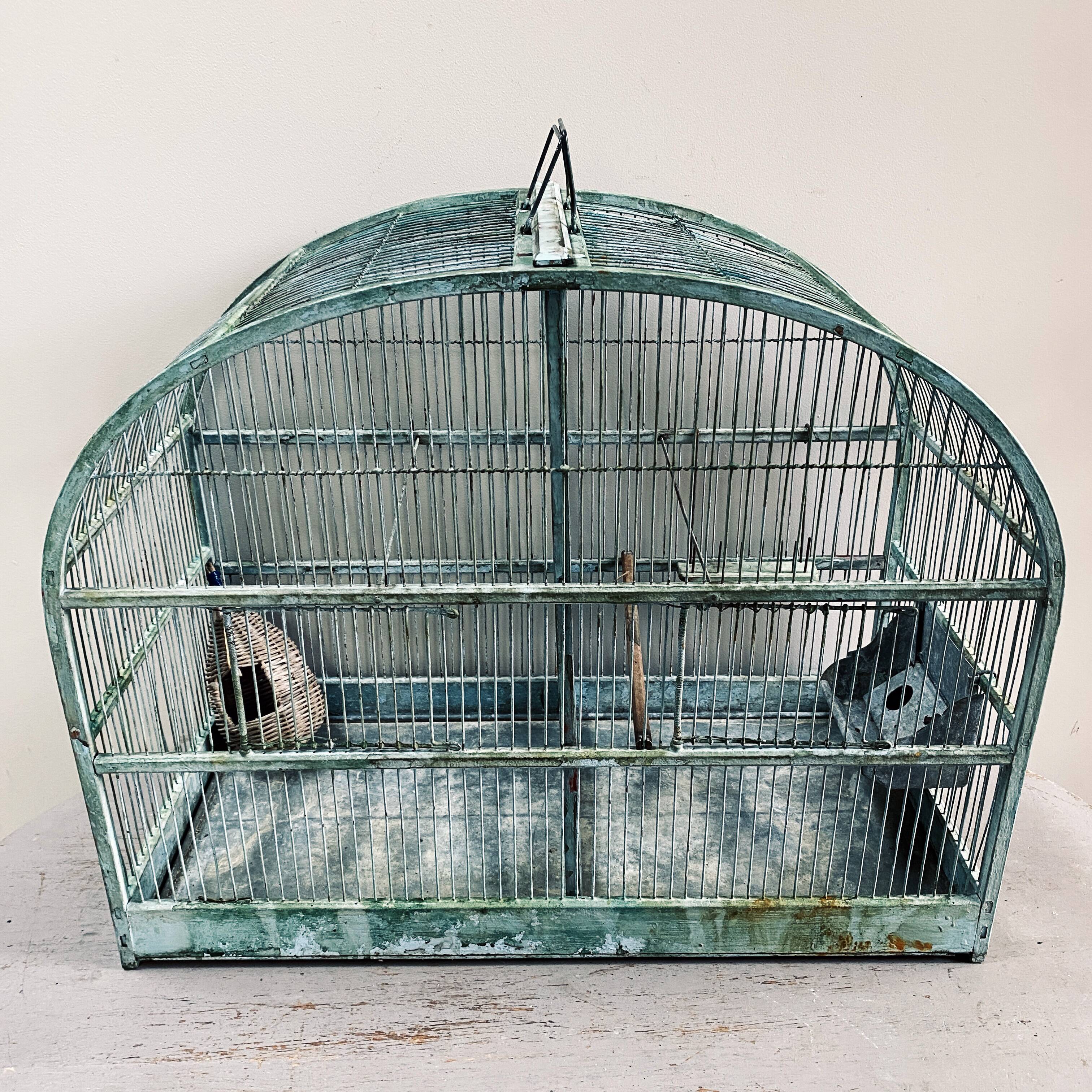 Water green patinated metal cage