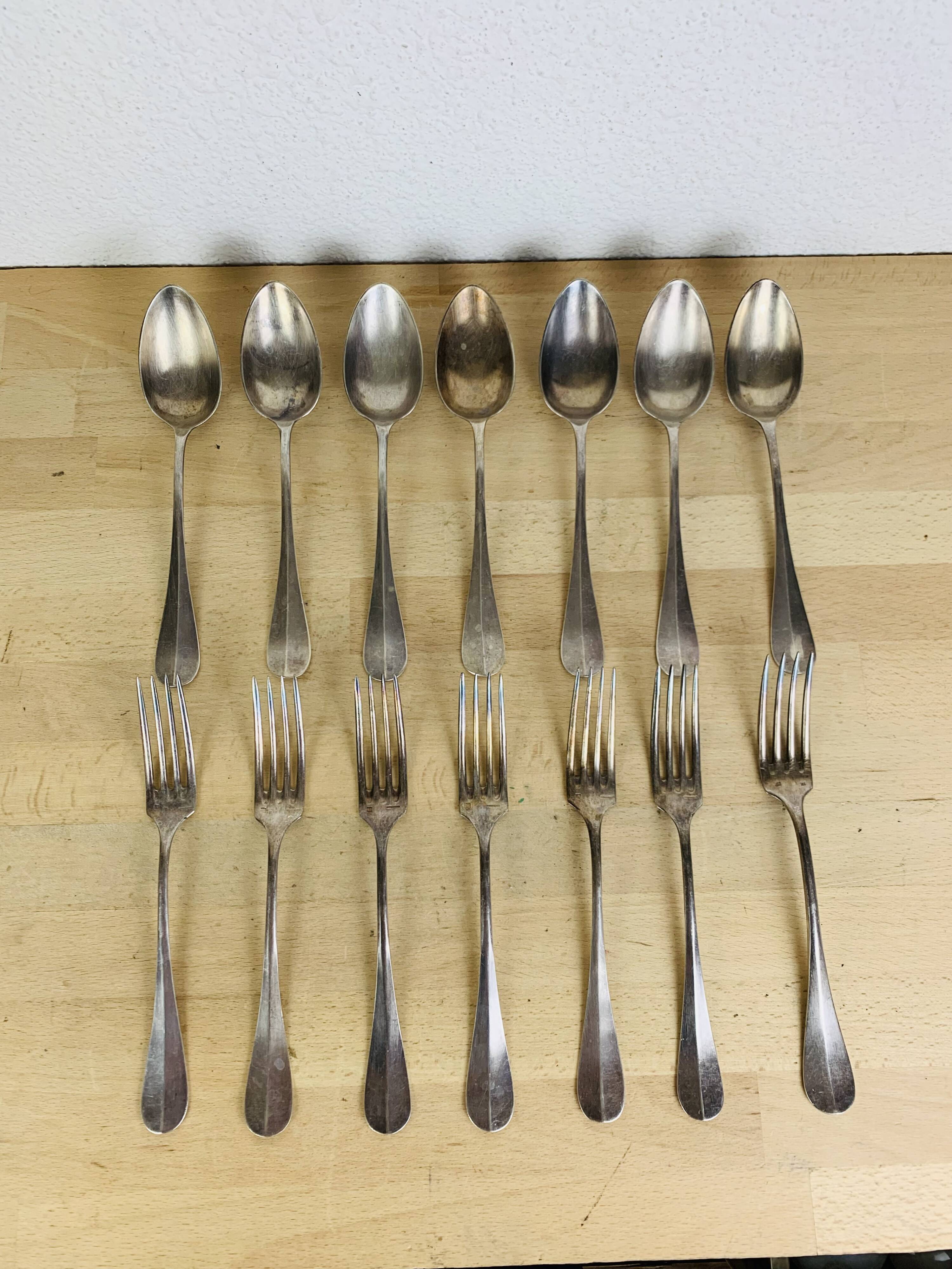 7 vintage silver plated forks and 7 spoons