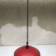 Old red metal suspension lamp from the 70s