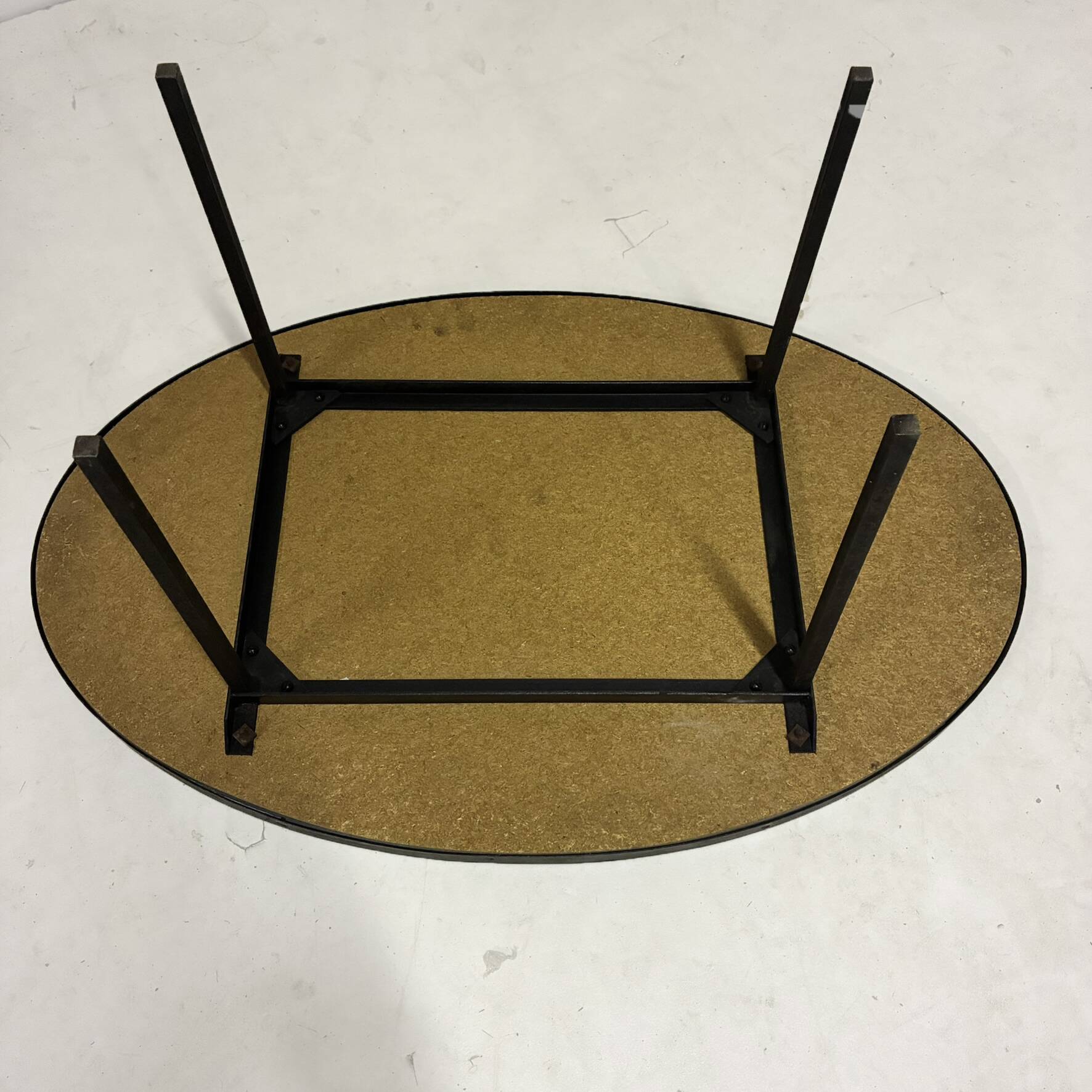 Oval coffee table in glazed ceramic and black metal, DLG by Mado Jolain.