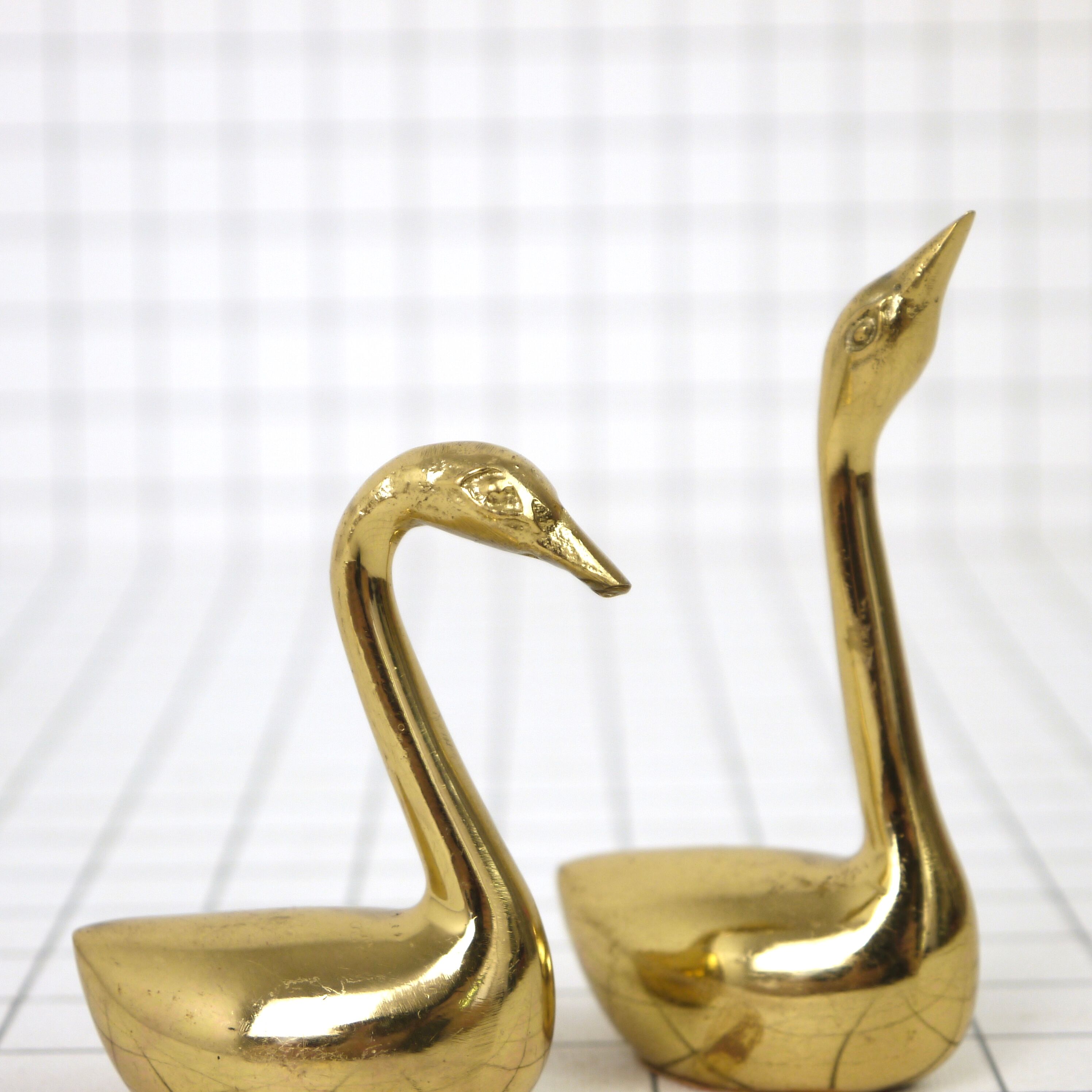 Pair of swans brass