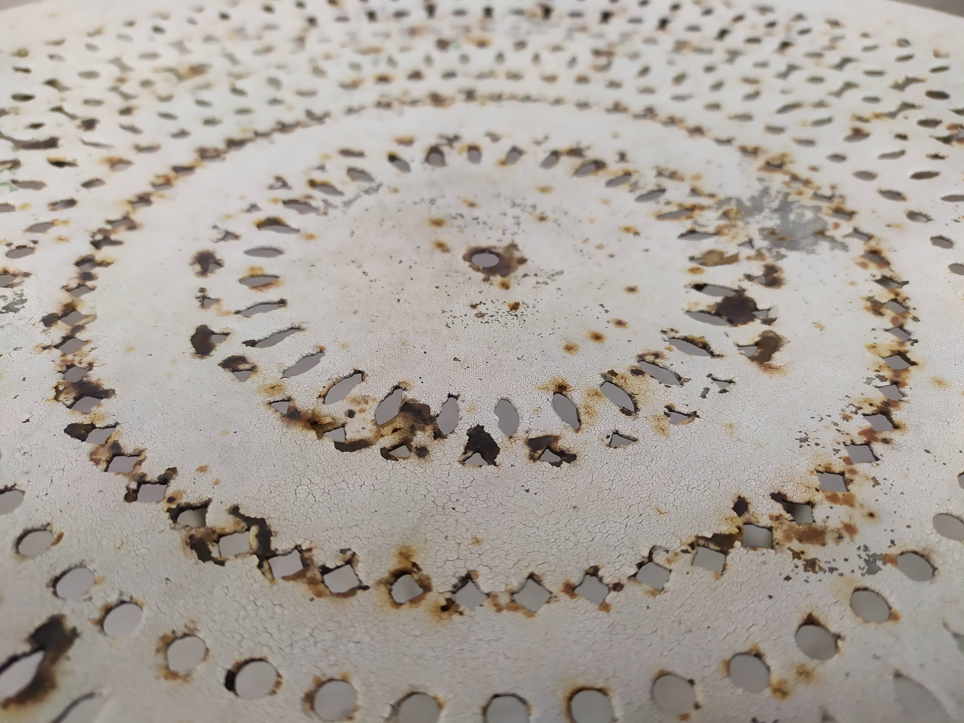 4 wrought iron garden armchairs