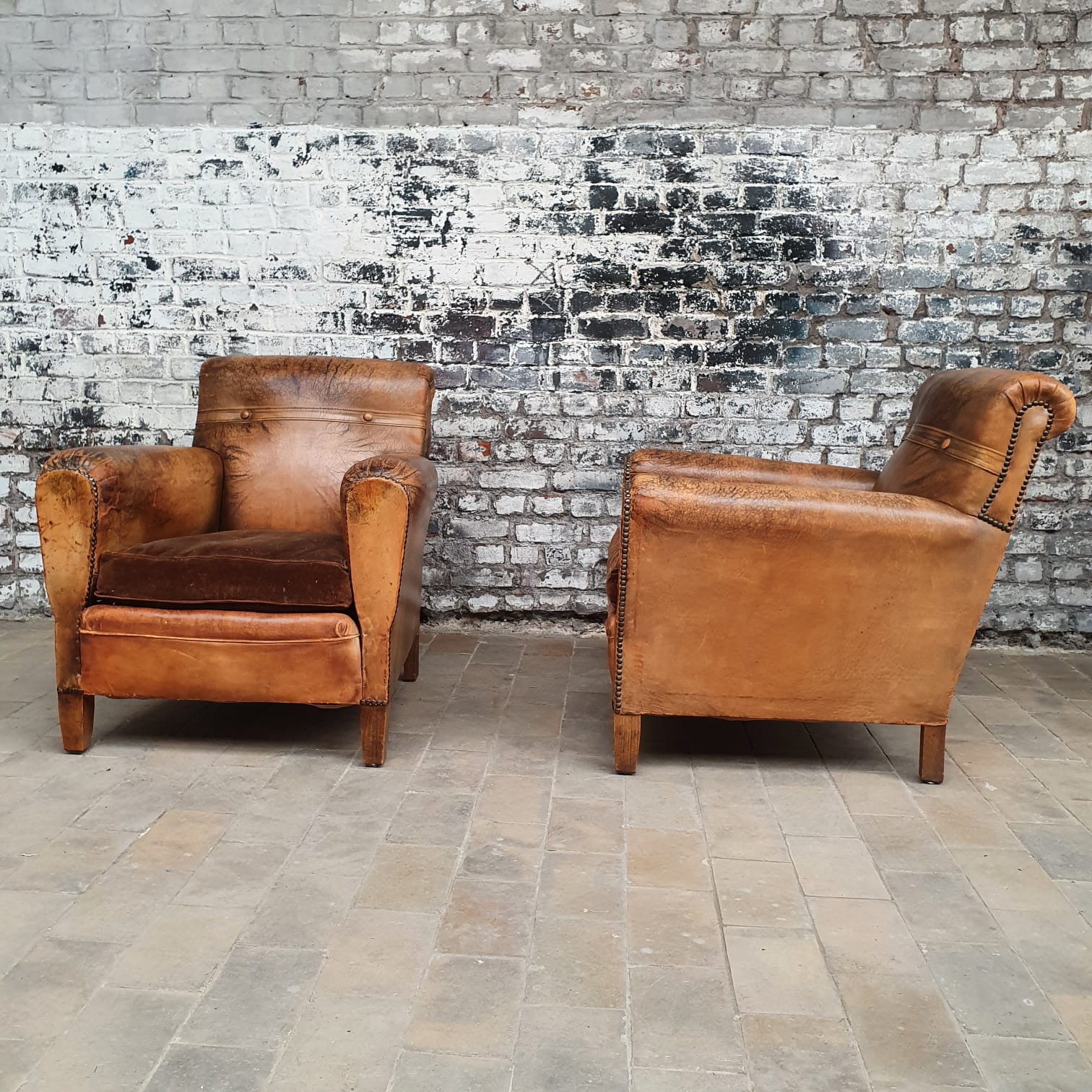 Pair of leather club chairs
