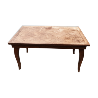 Coffee table with solid walnut geometric decoration