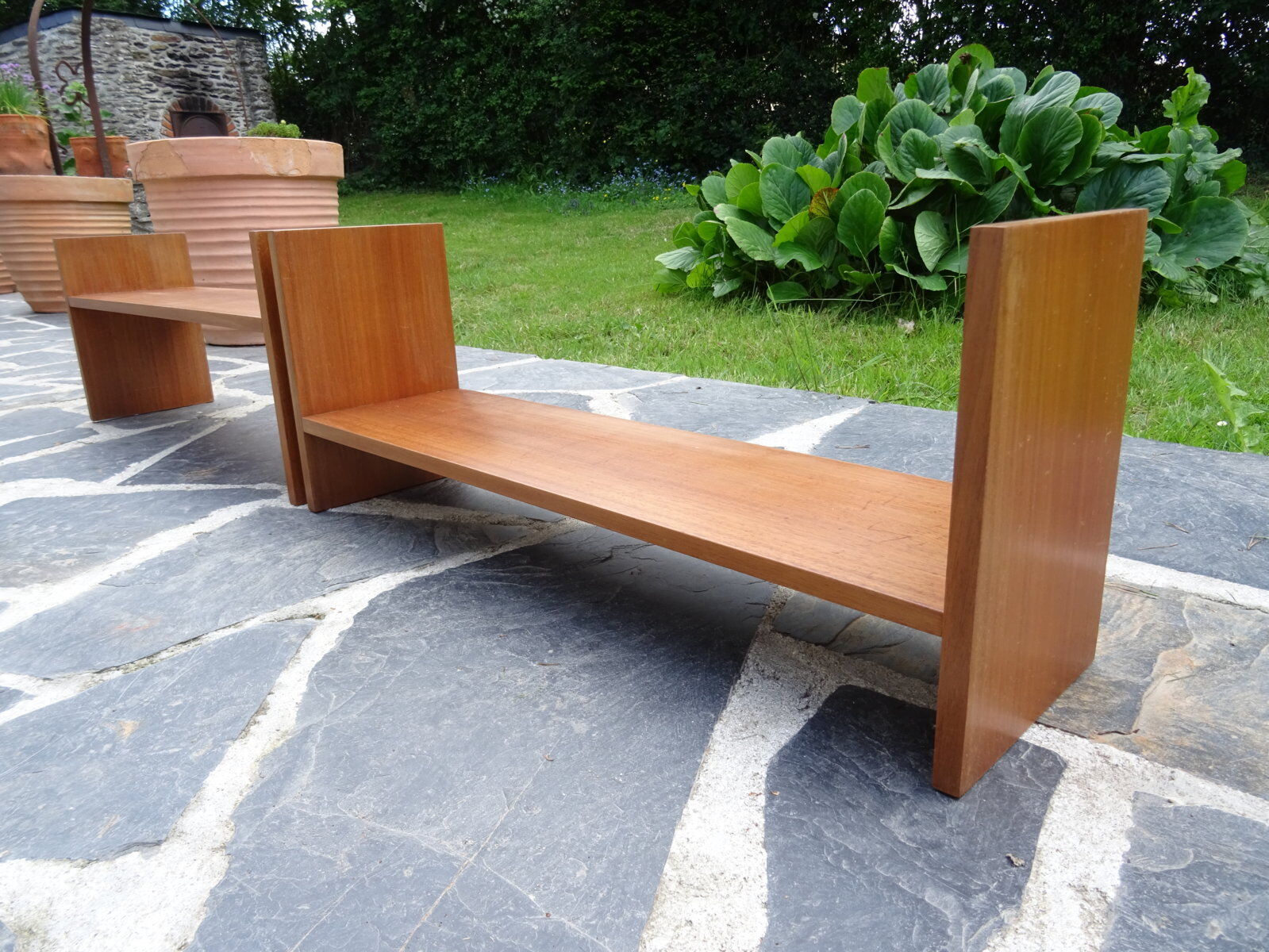 Pair of teak wall shelves