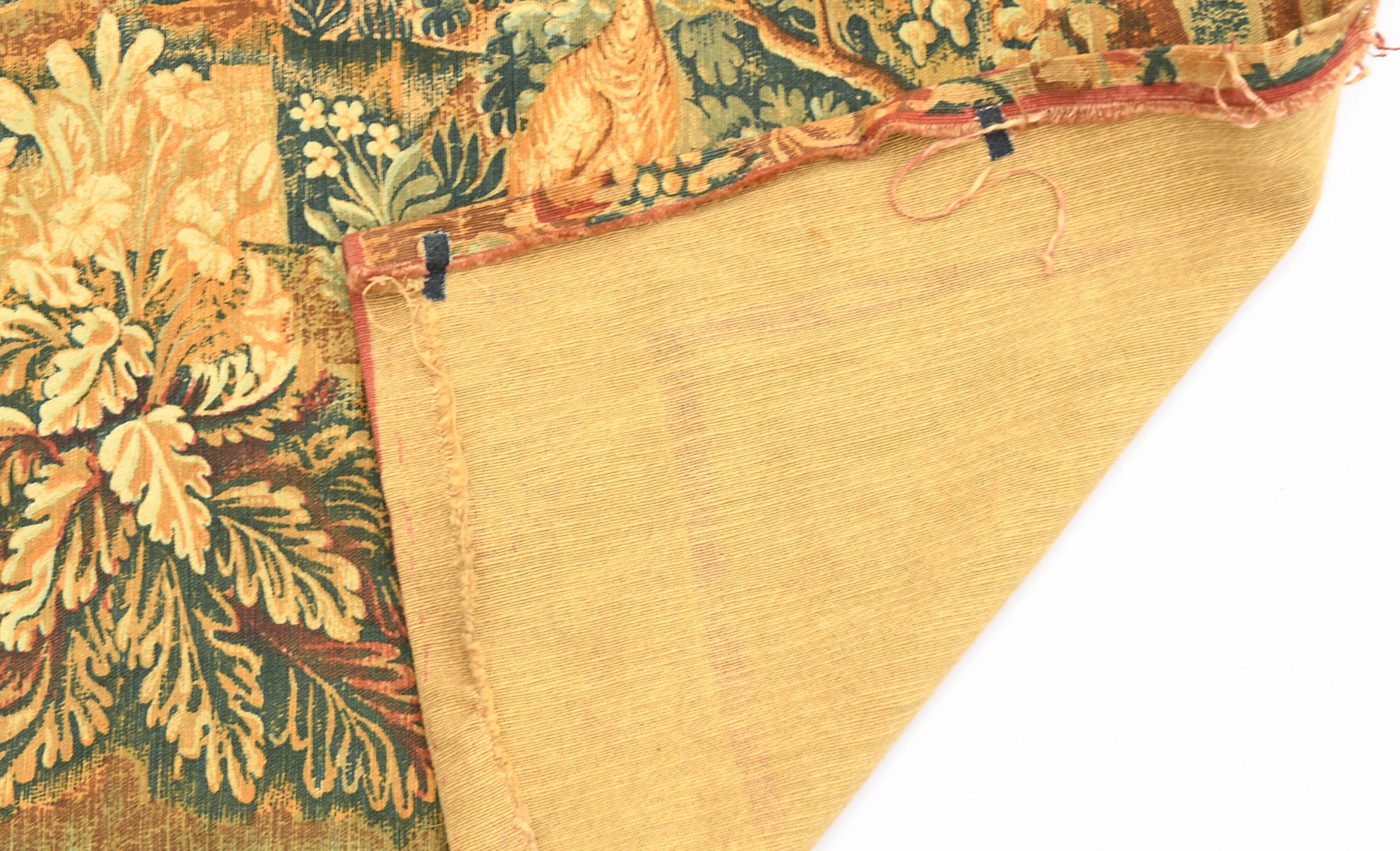 Printed green tapestry depicting birds in the park of a castle