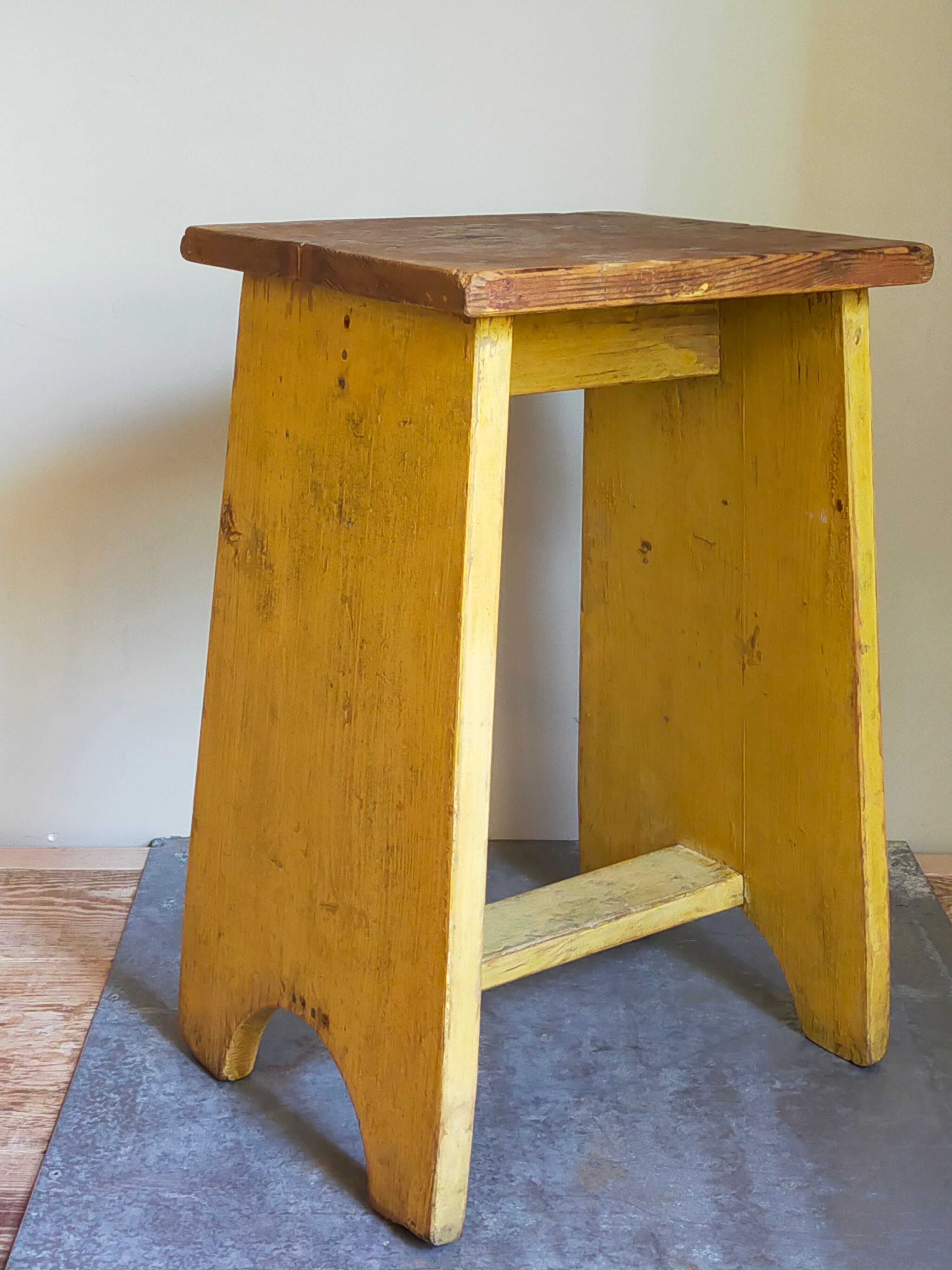 Art-populaire workshop stool in patinated painted wood