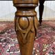 Victorian-style mahogany English table with 3 extensions.