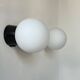 Pair of vintage Raak opaline and Bakelite wall lights, Netherlands 1970s