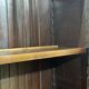 English walnut two-body library from the early 20th century.