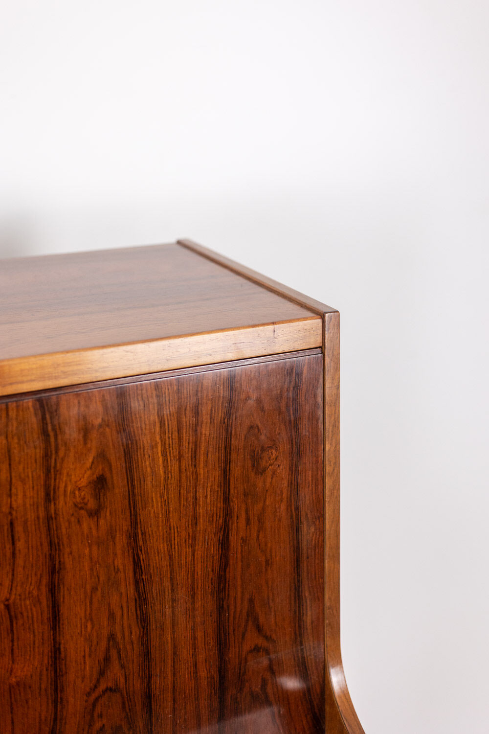 Rosewood chest of drawers with 2 drawers, forming a secretary. 1970s.