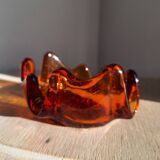 Amber glass pocket emptier