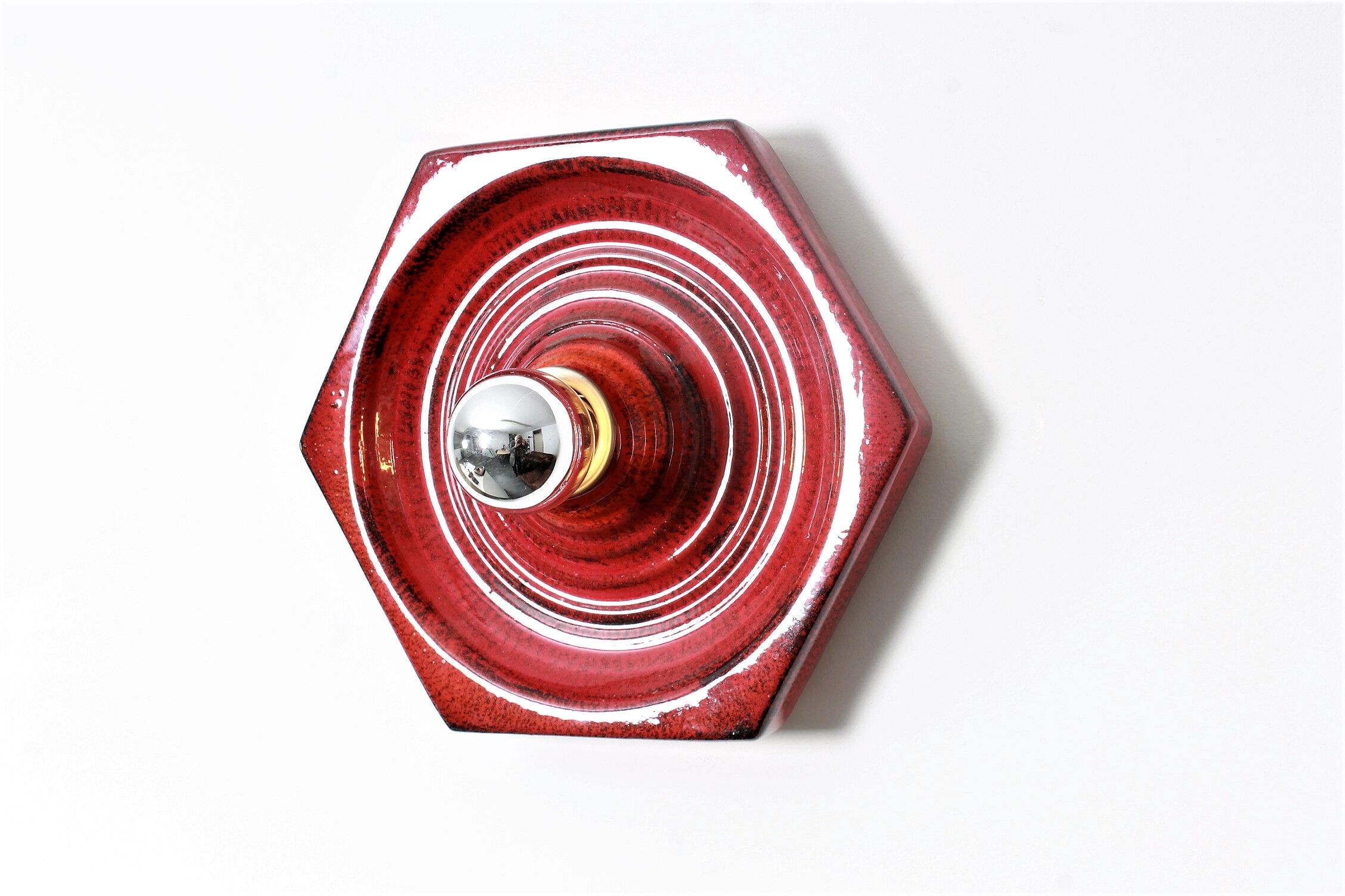 Wall sconce by Hustadt in shiny red