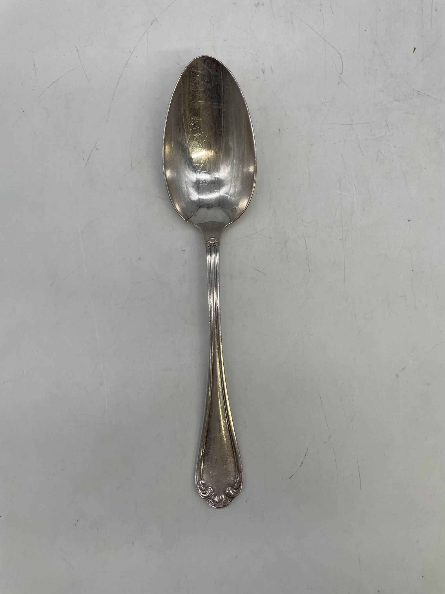 Set of 12 silver-plated soup spoons with Louis XV pattern.