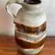 Large mudflated sandstone vase