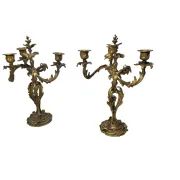 Pair of Louis XV style bronze candlesticks from the 19th century.