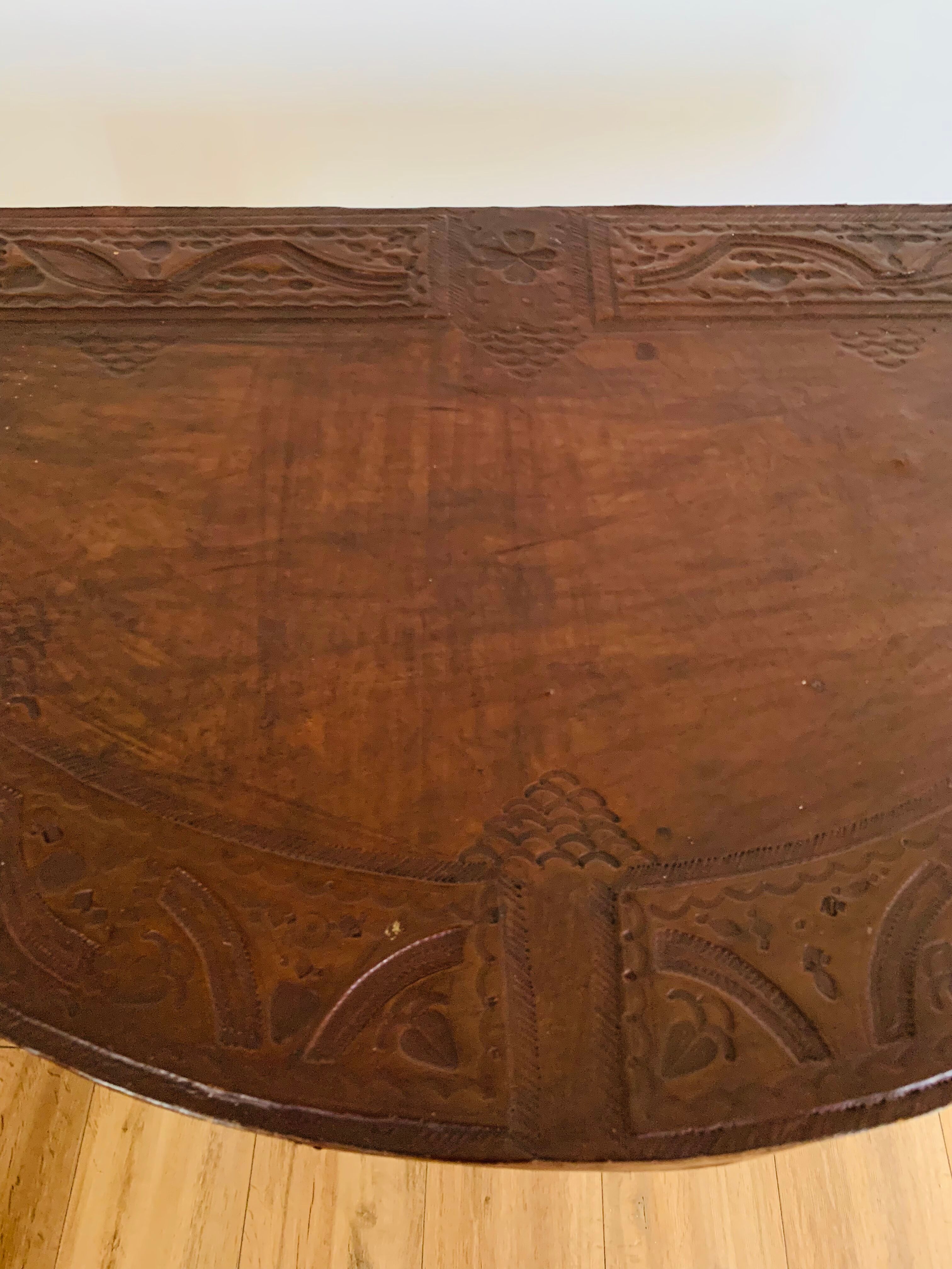 Console demi lune en cuir