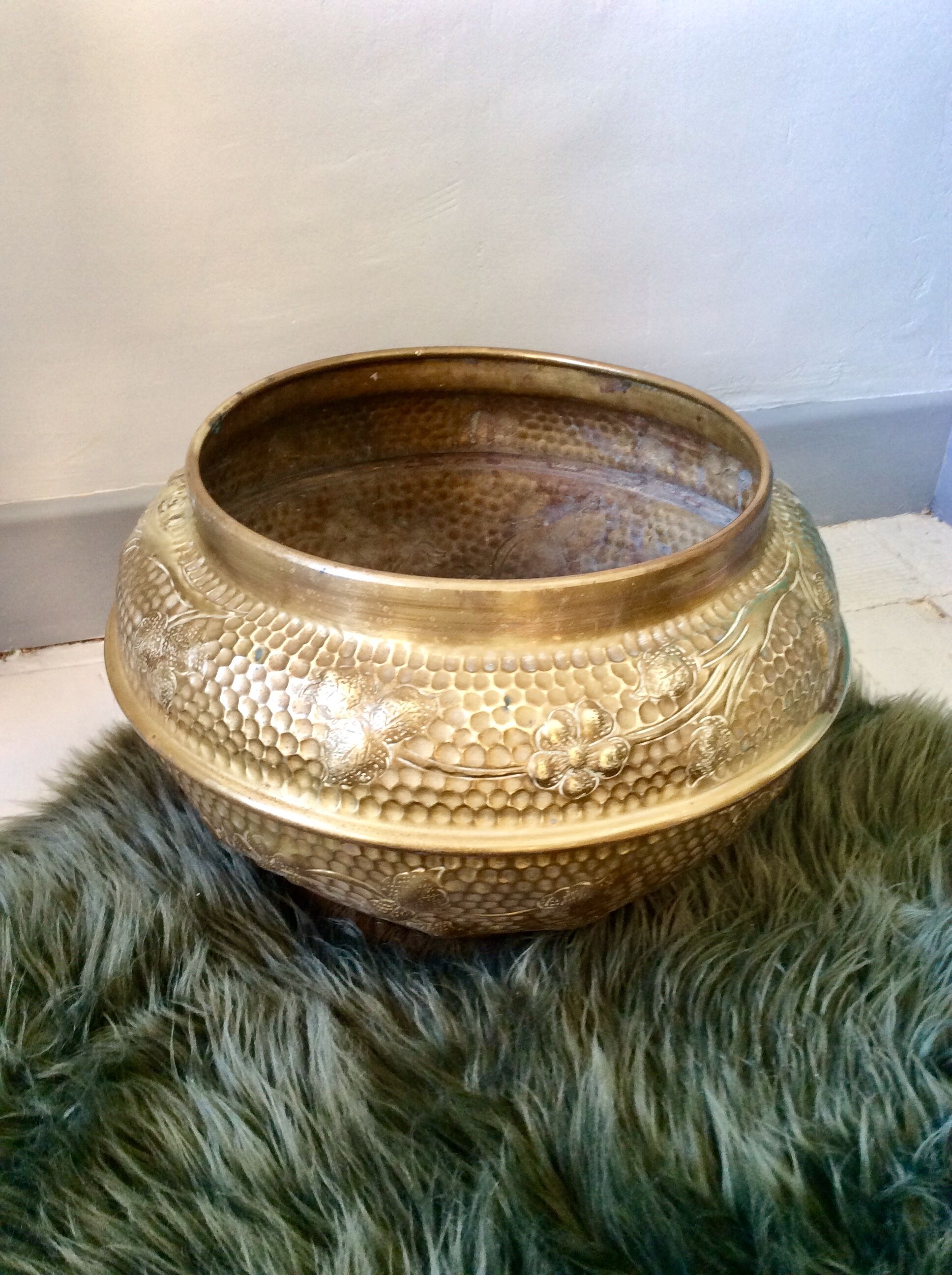 Old brass pot cover