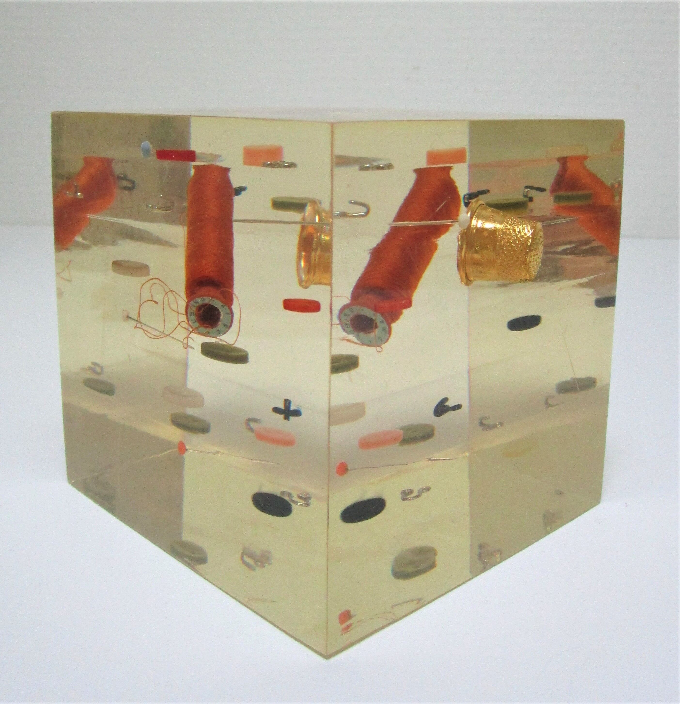 Paperweight sculpture block resin inclusions sewing design 70s