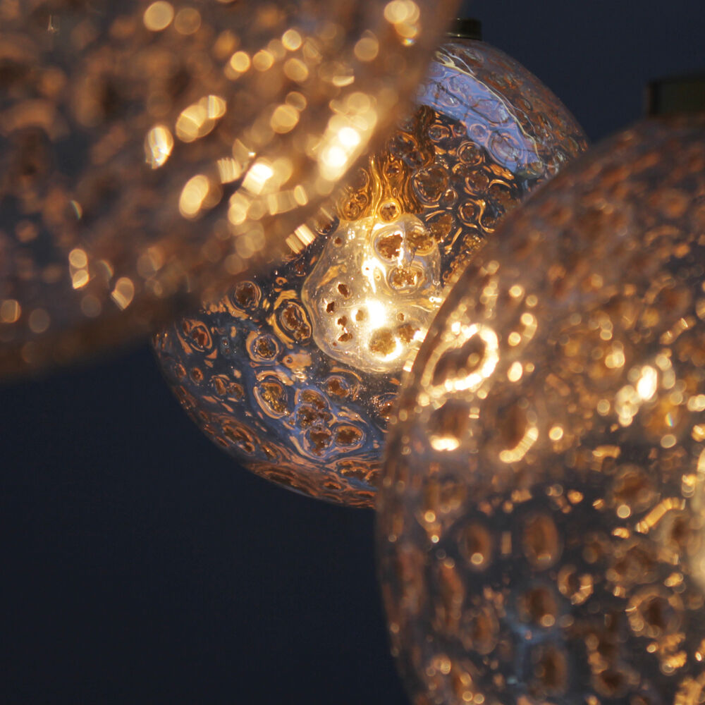 Four gold fleck globe pendants by Doria Germany