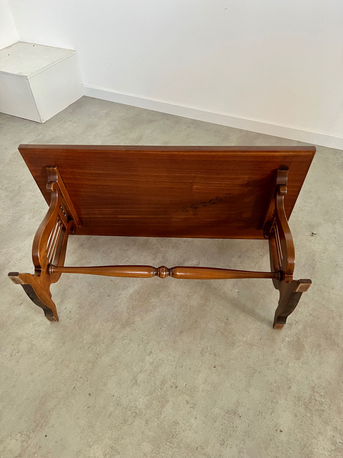 Old rectangular wood coffee table with lyre side posts